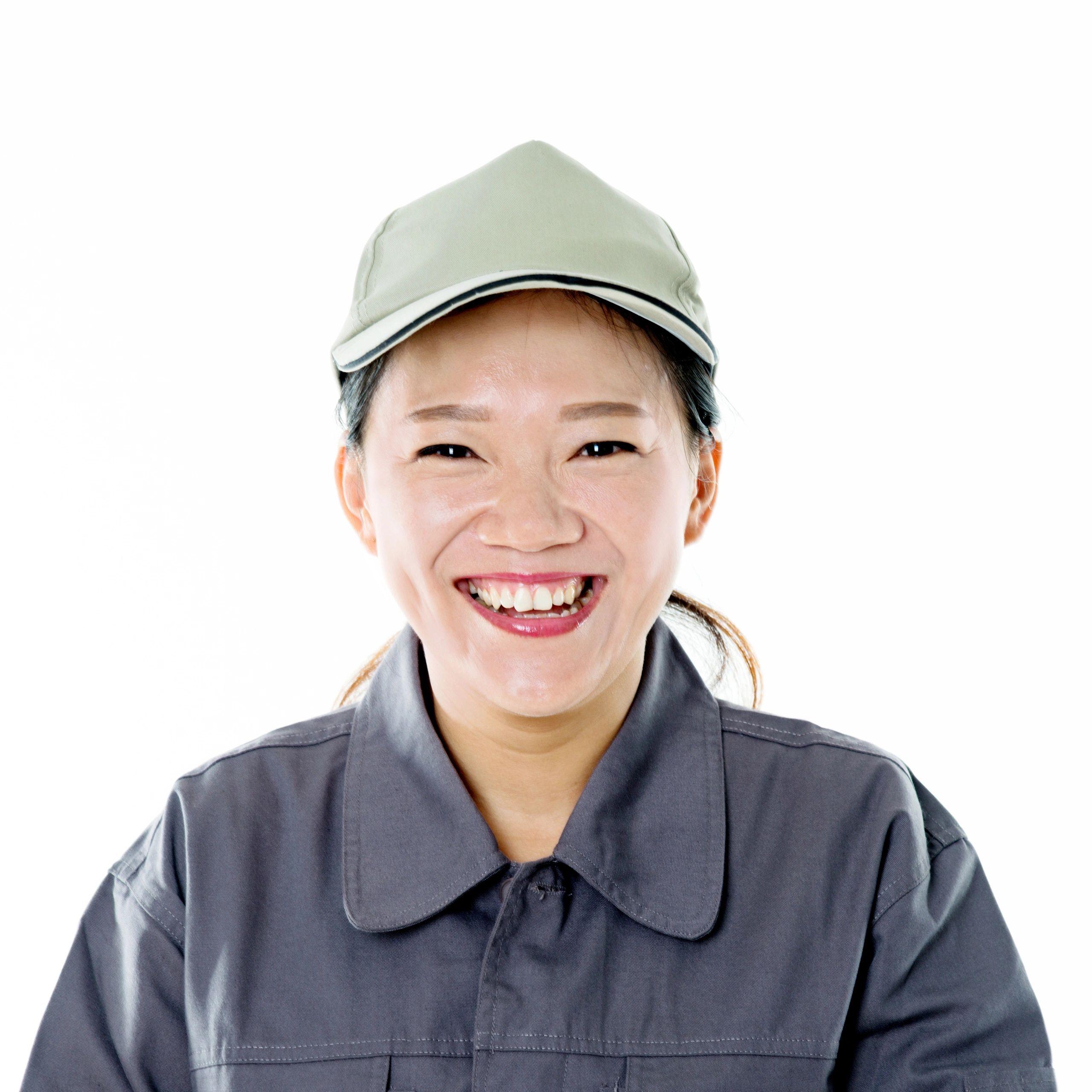 About Smiling team member in uniform portrait